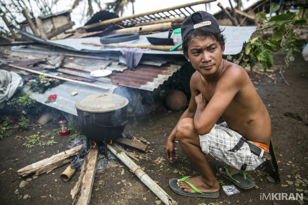 Mark cooking a local stu for the UNITED SIKHS volunteers. November 2013, Binutucan, Panay Island
