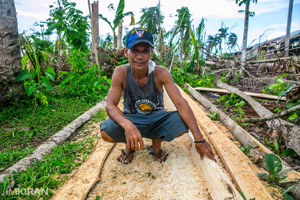 He has a kid working in Manila, but his job and home is here in the village. Lives on cutting logs to rebuild houses and fishing. He actually called me out to have his picture taken