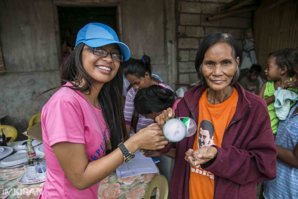 Gaycebel giving out the solar lights on behalf of Humanity First Canada