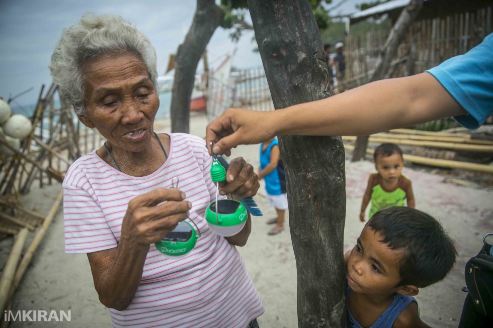 We then hand delivered to those who couldn't make it to the other part of the island as they lived far inside. She lives alone in a hut with her grandson