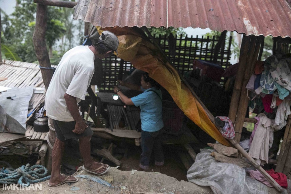 He lives in this hut or shelter, I was not sure if this was really his home till i saw the kitchen and his clothes inside. The floor is where the old house use to be.