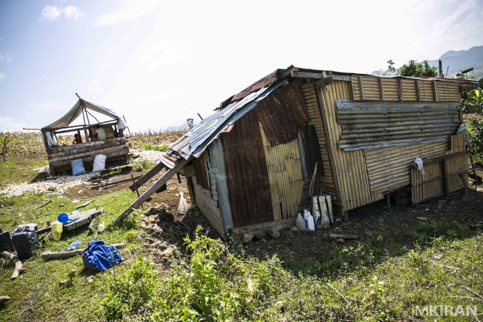 One of the rebuild homes with spare parts by the local Ati man after the old house was destroyed by the Haiyan typhoon on 8th November 2013. - Ati Tribe, Mount Tag-ao